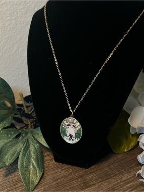 UFO And Sasquatch Pendant Necklace - Green/Gold Gold-Tone Oval / Cryptid